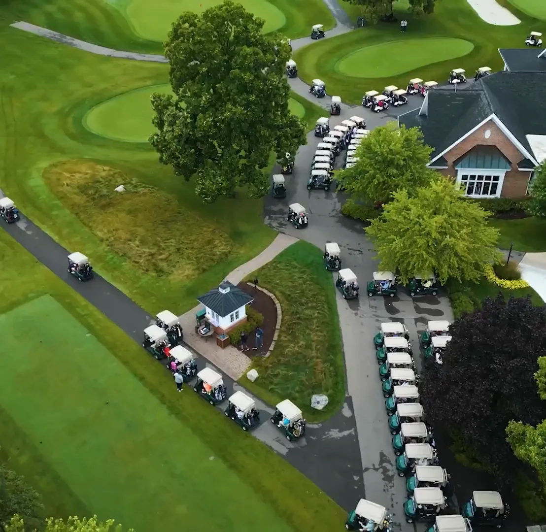 Aerial view of a Michigan golf course and clubhouse, a frame from Fivenson Studios client video work